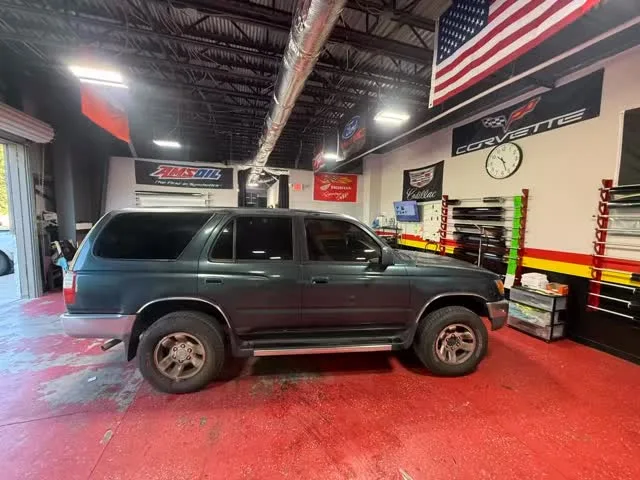 Dark SUV with fresh ceramic tint in the Powhatan bay